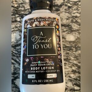 Bath & Body Works A Toast To You Body Lotion - NWT
8 fl oz size.w/Shea butter &